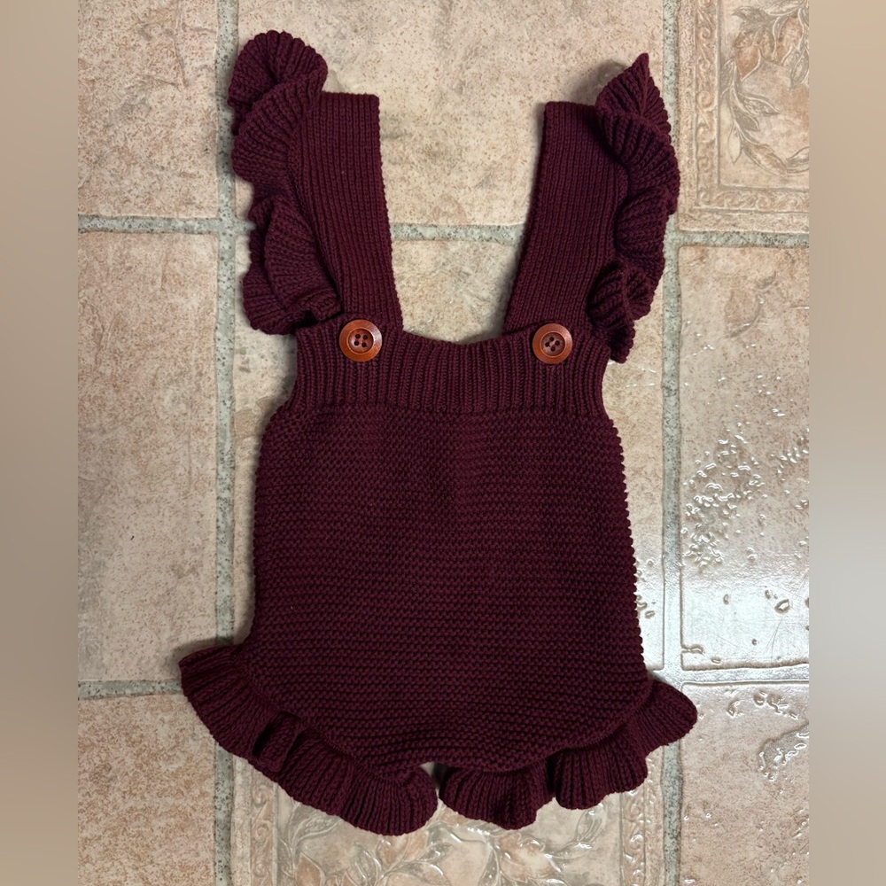 Knitted baby romper